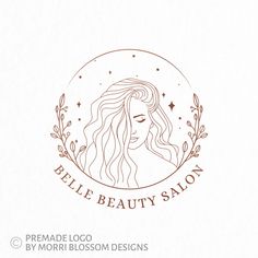 a logo for a beauty salon with a woman's face and leaves around it