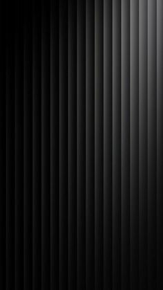 an abstract black and white background with vertical lines