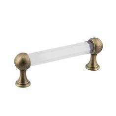 an antique brass finish toilet roll holder with clear glass cover on the top and bottom