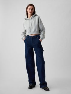 Fit: A full-length loose jean that's fitted on the waist & relaxed all the way down.  Fabric: 99% Organic Cotton, 1% Stretch.  Stretch: Low Stretch Jeans.  Authentic denim with a soft & easy lived-in feel. ​ Rise: Mid Rise Jeans.  Look: A carpenter jean in a dark indigo wash.  Details: Zip fly, front slant pockets, back patch pockets, carpenter loop & pockets at side.  Responsibly Made: This pair of jeans is part of our water-saving Washwell program.  Compared to conventional wash methods, Washw Gap Bottoms With Five Pockets For Fall, Gap High Waist Relaxed Fit Jeans, Gap Casual Full Length Jeans, Gap High Waist Jeans For Fall, Gap Casual Jeans, Casual Full-length Gap Jeans, Casual Full Length Gap Jeans, Gap Casual Medium Wash Pants, Gap Relaxed Fit Wide Leg Jeans