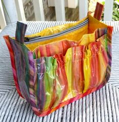 a multicolored bag sitting on top of a table