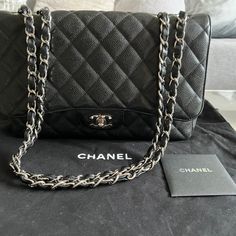 Selling An Authentic Chanel Classic Caviar Jumbo Flap In Silver Hardware. This Item Was Purchased At The Chanel Boutique In 2010. This Bag Is Very Spacious But Still Lightweight. The Back Of The Bag Had Some Color Rub Off (I Think From Brushing Against My Jeans), But The Rest Of The Handbag Is In Great Condition. You Can Bring The Bag To Chanel To Have Them Recolor It For A Fee Or To Leather Surgeons. Comes With The Chanel Dust Bag (There Are Two Minor White Stains On The Dust Bag). Dimensions 7 Chanel Jumbo Flap, Chanel Boutique, Chanel Jumbo, White Stain, Fashion Baby, Chanel Bags, Brushing, Chanel Handbags, Flap Bag