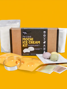 the mochi ice cream kit contains two scoops and three ingredients, along with an orange background