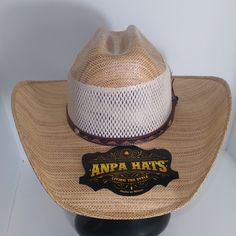 Anpa Living The Style Men's Handmade Brown/Tan Breathable Side Feather Cowboy Hat * New With Tag * Made From 100% Palm Tree * Light Weight * Brown Leather Braided Band * 24.5" Head Circumference/Size Medium * Made In And Imported From Mexico Fitted Cream Panama Hat In Western Style, Fitted Cream Western Panama Hat, Western Cream Straw Hat With Short Brim, Cream Western Straw Hat With Short Brim, Western Style Cream Straw Hat With Short Brim, Western Brown Panama Hat One Size, Western Cream Sun Hat For Rodeo, Western Style Cream Sun Hat For Rodeo, Adjustable Cream Hats For Ranch