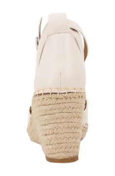 An earthy espadrille-style wedge keeps your look warm-weather ready in a stylish leather sandal complete with a well-cushioned footbed for endless comfort. 3" heel Multilayered, PORON®-cushioned footbed Leather upper and lining/rubber sole Imported Natural Color Wedge Sandals With Round Toe Platform, Leather Footbed Wedge Sandals For Vacation, Natural Leather Wedge Sandals With Cushioned Footbed, Casual Wedge Sandals With Ankle Strap And Leather Footbed, Casual Wedge Sandals With Ankle Strap, Cream Leather Espadrilles For Beach, Leather Espadrilles With Woven Sole And High Heel, Cream Leather Espadrilles For The Beach, Cream Leather Open Toe Espadrilles