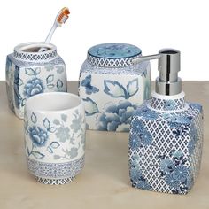 Blue and white 4 piece ceramic bathroom accessory set.  Includes: one toothbrush/toothpaste holder, one tumbler, one whatnot dish and one lotion dispenser.  The design is blue and white flowers and a blue and white diamond shape design on all four pieces, but more on the lotion dispenser. Modern Victorian Bathroom, Cotton Ball Holder, 4 Piece Bathroom, Beach House Living Room, Silver Bathroom, Ceramic Accessory, Victorian Bathroom, Blue White Decor, Floral Bath