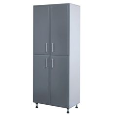 a tall gray refrigerator freezer sitting on top of a white floor