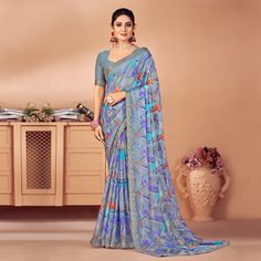 Grey colored saree is made from chiffon fabric which is highlighted with beautiful printed with lace border work as shown. Comes along with unstitched chiffon blouse piece which you can customise as per your design/style. Occasion - You can wear this saree for casual and daily wear. Note:- the actual product may differ slightly in color and design from the one illustrated in the images when compared with computer or mobile screen. Measurements: Saree : Chiffon : 5.5 Mtrs Blouse : Chiffon : 0.8 Mtr Material: Chiffon Stitch Type: Unstitched Country of Origin: India Care Guide: Dry Clean Saree With Lace Border, Printed Chiffon Saree, Saree Chiffon, Blouse Chiffon, Mobile Screen, Silk Lehenga, Lace Border, Chiffon Saree, Chiffon Blouse