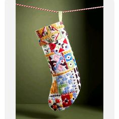 a christmas stocking hanging from a clothes line