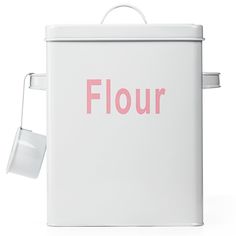 a white box with pink lettering that says flour