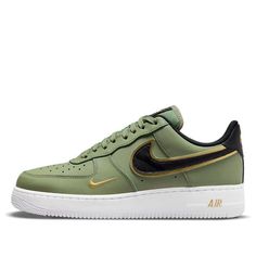 The Nike Air Force 1 '07 LV8 'Metallic Swoosh Pack Oil Green' is a stylish and modern sneaker. It features a smooth olive green leather upper with a mesh tongue and matching laces. The black Swooshes, metallic gold layer underneath and gold branding on the toe, tongue, heel, and insole complete the look. The white AF1 rubber sole adds the perfect finishing touch. This sneaker is perfect for everyday wear, or for a night out. It's inspired by the classic Air Force 1 silhouette, and part of the 'Metallic Swoosh Pack' series. (AF1/SNKR/Skate/Men's/Low Top/Wear-resistant) Nike Air Force 1 With Modern Style, Modern Nike Air Force 1 With Boost Midsole, Green Nike Air Force 1 With Air Max Cushioning, Green Nike Air Force 1 Sneakers, Modern Nike Air Force 1 With Cushioned Footbed, Modern Nike Air Force 1 For Sports, White Af1, Skate Man, Nike Air Force 1 07