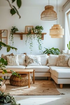 a living room filled with furniture and plants