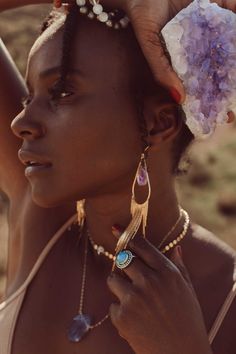 Our most popular crystal fringe statement earrings now come with Amethyst crystals. These unique tassel earrings look stunning when the light dances off of them! They are the perfect bridal or bridesmaids earrings or would make a great gift for yourself or a girlfriend. Amethyst is a stone of intuition, connecting you to your inner wisdom, empowering you to trust yourself! Amethyst crystals *color of purple amethyst is lighter purple and ranges in lightness Gold fringe earrings Weight: .22 oz Dr Wedding Jewelry With Tassels, Glamorous Tassel Earrings For Wedding, Wedding Jewelry With Tassels, Dangle Shape, Elegant Fringe Jewelry For Weddings, Elegant Fringed Jewelry For Weddings, Tassel Earrings For Wedding, Bohemian Teardrop Jewelry For Wedding, Purple Beaded Fringe Drop Earrings, Festival Teardrop Beaded Fringe Jewelry