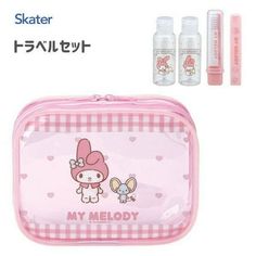 a pink hello kitty bag with two bottles and an eraser next to each other