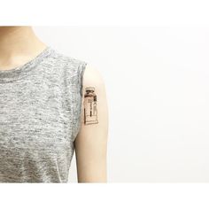 a person with a small tattoo on their arm