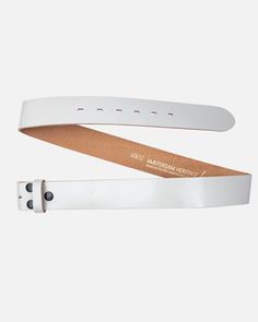 As part of the interchangeable buckle collection, meet the smooth leather belt strap - Mia. The sleek strap is handcrafted using the premium Italian leather and is designed with versatility and durability in mind. With a polished finish, the leather strap is available in a range of sizes and colors, ensuring that you can find the perfect match for your favorite buckle. With an easy closing; pick your belt strap, match with a jewel buckle of your choice, close the snaps and style it anyway you wa Modern Leather Belt With Smooth Grain, Adjustable Leather Belt, Leather Belt With Removable Feature For Everyday, Classic Adjustable Leather Strap Belts, Modern Belt Buckles With Belt For Everyday Use, Classic Leather Strap Belt For Everyday Use, Classic Leather Strap Belt, Classic Leather Strap Belts For Everyday Use, Classic Belts With Leather Strap For Everyday Use