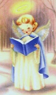 an angel reading a book in the snow