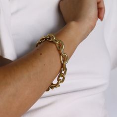 Match the strong links gold bracelet with other link bracelets to create the ultimate arm party! PRODUCT DETAILSMaterials: Pewter alloy base plated with 24-kt gold / sterling silver. fresh water pearlsMeasurements: ﻿7.5" longClosure: Toggle clasp Gold Bangle-style Chain Bracelet For Parties, Gold Bangle Chain Bracelet For Party, Gold Metal Pearl Bracelet For Party, Gold Chunky Chain Link Bracelet, Gold Chunky Chain Bangle Bracelet, Yellow Gold Metal Chain Bracelet For Party, Adjustable Gold Metal Pearl Bracelet, Classic Gold Metal Bracelet, Gold Adjustable Link Chain Bracelet