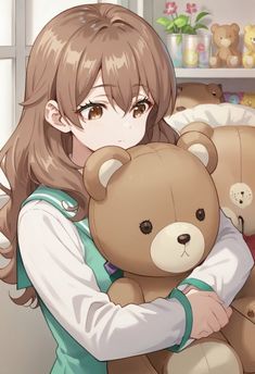 a girl holding a teddy bear in her arms