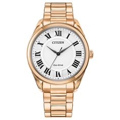 With meticulous quality and production, the Arezzo from Citizen is a timepiece sure to turn heads wherever it goes. Featuring a new, subtly oversized silhouette, it boasts a rose gold-tone stainless-steel bracelet with a deployment clasp and a slightly oversized, 35-millimeter, stainless-steel case. A classic style with an elevated design, this watch showcases a three-hand silver-tone dial with sophisticated Roman numerals. Citizen has pioneered watchmaking for over 100 years, achieving excellen Sleek Watch, Eco Drive Watches, Gold Plated Watch, Helzberg Diamonds, Citizen Watch, Citizen Eco, Three Hands, Rose Gold Case, Eco Drive