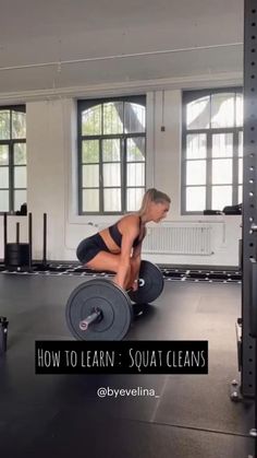 a woman squats down with a barbell in front of her and the words how to learn squat clean