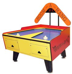 an arcade game table with a sign above it that says, boom - a - bang