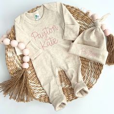 ✿ Welcome to our shop ✿ Our goal is to bring you the cutest and trendiest designs on the highest quality sweatshirts and shirts. All of our products are designed, embroidered printed, pressed, and shipped from our NJ studio. This adorable sleeper makes a perfect coming home outfit, newborn pictures, or baby shower gift. This features an ultra soft romper, with stitched name. Matching hat that will come with matching stitching. This outfit makes a perfect coming home outfit, newborn pictures, or Cute Cotton Onesie With Crew Neck, Custom Name Cotton Top As A Gift, Long Sleeve Onesie For Birthday, Cute Cotton Crew Neck Onesie, Cotton Long Sleeve Onesie, Unisex Cotton Onesie For Gender Reveal, Cotton Onesie With Letter Print For Gender Reveal, Long Sleeve Cotton Onesie, Cotton Onesie With Letter Print And Crew Neck