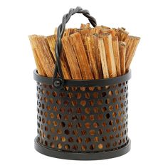 a metal basket filled with lots of sticks