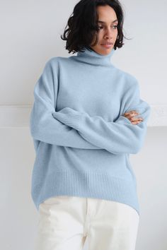 Knit fabric Turtle neck Drop shoulders Rib finish at hem and cuff Relaxed fit American Sweater, Loose Turtleneck, Solid Sweaters, Loose Long Sleeve, Womens Turtleneck, Women Sleeve, Loose Sweater, Chunky Knits Sweater, Knit Fashion