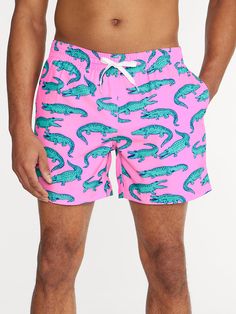 Grab your sunglasses and your flamingo floaty and sink into island time with these classic swimmers. These jealousy-inducing trunks feature an ultra quick drying shell, mesh basket liner and a zipper back pocket. Not to mention the elastic waistband and build-in drawstring designed to keep your trunks secure from the swim up bar all the way to the all you can eat crab leg buffet. Fabric: 92% Polyester/8% Spandex Machine Wash Cold, Tumble Dry Low Best for: Swimming, Sunbathing, Boat Days, Boogie Fun Swim Trunks For Beach Season, Swim Up Bar, Basket Liners, Sweat Shorts, Stretch Shorts, Back Pocket, Sport Shorts, Swim Trunks, Swim Shorts