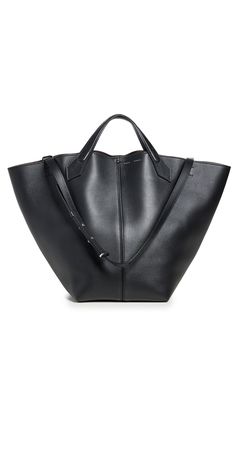 Find PROENZA SCHOULER Xl Ps1 Tote on Editorialist. Calfskin. Removable zip pouch. Top handles. Optional, adjustable strap. Leather lining. Weight: 24oz / 0.68kg. Made in Italy. Measurements: Height: 13.75in / 35cm Length: 19.25in / 49cm Depth: 11.5in / 29cm Strap drop: 19.75in / 50cm Handle drop: 3.5in / 9cm Luxury Large Shoulder Bag With Removable Pouch, Elegant Large Bags With Handles, Large Elegant Bag, Modern Shoulder Bag With Double Handle And Palladium Hardware, Modern Calf Leather Bucket Bag For Business, Luxury Large Shoulder Bag With Leather Handles, Sleek Top Handle Calf Leather Shoulder Bag, Calf Leather Tote Shoulder Bag For Business, Luxury Large Satchel With Leather Handles