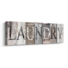 the word laundry written in multiple letters on a white background canvas wall art print, ready to hang