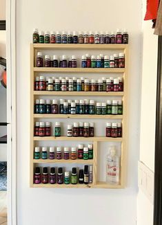 "Handmade wood shelving, perfect for essential oils, nail polish, thread & more! My husband hand makes each and every one! dim. are 26\"tall x 17\" wide 1.5\" deep The openings are 3.5\"tall & the larger area is 7.5\"tall Custom orders upon request. Satisfaction guaranteed! Thanks for looking!" Oil Display, Oil Rack, Nail Polish Shelf, Oil Shelf, Essential Oil Shelf, Essential Oil Holder, Nail Polish Holder, Nail Polish Rack, Shelf Hanging