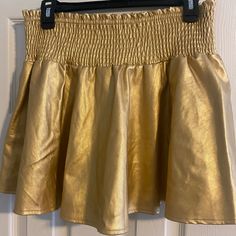 Nwt Flirty Gold Skirt With Skort Underneath; Smile Page But Can Fit Larger Gold Lined Skirt For Night Out, Gold High-waist Skirt For Night Out, Gold High Waist Skirt For Night Out, Chic Gold Flared Skirt, Gold Mini Skirt With Lining, Gold Lined Mini Skirt For Spring, Party Mini Skirt With Elastic Waistband, Gold Stretch Skirt For Summer, Gold Relaxed Skirt Bottoms For Spring