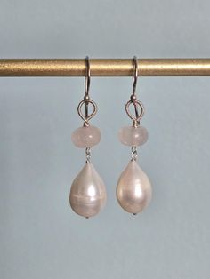 Baroque Pearl Pink Quartz Sterling Silver Wire Earrings, Wedding Earrings, Teardrop Pearl, June Birthstone. length of Earrings is 1.7" ( 45 mm.) * Processing time is 3 - 5 days.  * US orders are shipped first class mail. * International orders are shipped first class international. * Shipping upgrades are available at checkout. Thank you for visiting my listing! Have a wonderful day! White Baroque Pearl Teardrop Earrings, Elegant Baroque Pearl White Earrings, Pear-shaped Baroque Pearl Earrings For Weddings, Pear-shaped Baroque Pearl Earrings In Pearl White, Silver Wire Earrings, White Baroque Pearl Earrings, Round Shape, Pink Quartz, Quartz Rose, Wire Earrings