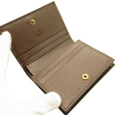 Gucci 658244 Jumbo GG Bamboo Canvas Leather Brown Bifold Wallet 0153GUCCIBrand: GucciGender: WomenColor: BrownMaterial: GG canvas, LeatherSize (HxWxD): 8.5cm x 11cm x 2.5cm / 3.34'' x 4.33'' x 0.98'' Gucci Brown Wallets With Interior Card Slots, Luxury Beige Gucci Wallets, Luxury Brown Gucci Wallet, Classic Gucci Wallets With Gold-tone Hardware, Gucci Rectangular Wallet With Gold-tone Hardware, Vuitton Bag, Canvas Leather, Diaper Backpack, Casual Backpack