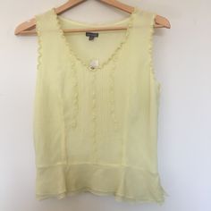 Beautiful Sunshine Yellow Ann Taylor 100% Silk Peplum Blouse, New With Tags Still Attached. Beautiful Frilly Trim And Fully Lined Blouse With A Very Flatering Tailored Fit, And Hidden Side Zipper To Slip Into. Originally Retails For 69.00, One Small Hole On Second Side Of Double Lining On Bottom, Which Means Won't Ever Be Seen When Wearing But Wanted To Disclose As Pictured. Pit To Pit: 17 In. Pit To Hem: 12.5 In. Beautiful Sunshine, Sunshine Yellow, Peplum Blouse, Side Zipper, Ann Taylor, Top Blouse, Womens Tops, Trim, Silk