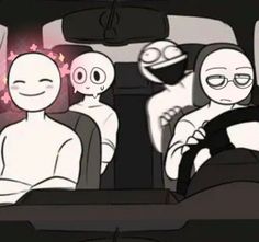 two people sitting in the back seat of a car, one is wearing a mask