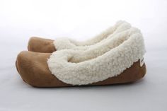 "These women's sherpa slippers feature sherpa suede fabric that will keep you warm and comfortable when your house is cold! I made these women's slippers with soles - vinyl comes standard - to add durability and make them less slick on hard surfaces. If you're looking for a near-barefoot, soft sole feel, these slippers are perfect for you! Did I mention they're washable?  FEATURES: -   Made from a man-made material that looks like suede on the outside and lambs wool on the inside - it's so soft Unique High Heels, Bride Slippers, Womens Sherpa, Baby Shoe Sizes, Wool Slippers, Wool Winter, Crochet Shoes, Suede Fabric, Slipper Socks