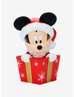 a mickey mouse figurine in a red box with snowflakes on it