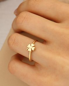 14K Four Leaf Clover Gold Ring, Lucky Shamrock Ring, St. Patrick's Day Jewelry, Clover Leaf Ring, Good Luck Charm Crafted in luxurious 14K gold, this Four Leaf Clover Ring embodies the essence of luck and charm. Symbolizing good fortune and prosperity, the delicate shamrock design makes it a perfect accessory for St. Patrick's Day celebrations or everyday wear. The intricate detailing of the four-leaf clover adds a touch of whimsy and elegance to this exquisite piece of jewelry. Whether worn as a symbol of luck or as a fashion statement, this Clover Leaf Ring is a timeless and versatile addition to any jewelry collection. Embrace the essence of luck with this stunning piece that will surely turn heads and bring a touch of magic to any outfit. Four Leaf Clover Jewelry, Four Leaf Clover Ring, 4 Leaf Clover Jewelry, Clover Locket, Four Leaf Clover Necklace Gold, Clover Ring, Leaf Ring, Luck Charms, Four Leaf Clover