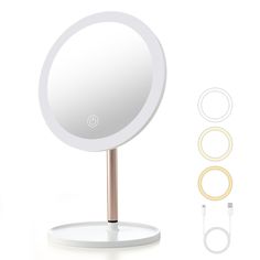 an image of a round mirror on a stand