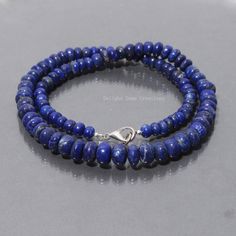 "Product Details :  Item Code : DGC2820 Gemstone Name :  LAPIS LAZULI Chain Style : BEADED Beads Shape : SMOOTH RONDELLE Beads Size :  5mm-9mm Approx Length : 18\" Inch Approx Weight : 200 Cts. Approx Customization : **Available** Please Feel Free To Contact If You Have Any Query." Halloween Beaded Jewelry, Lapis Necklace, Women's Necklace, Beaded Beads, Tigers Eye Necklace, Lapis Lazuli Beads, Blue Lapis Lazuli, Blue Lapis, Jewellery Gift