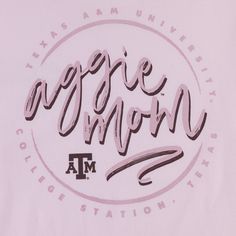 Show your Aggie pride with this stylish Texas A&M Pink Cursive Aggie Mom T-Shirt! It features a light pink shirt with "Aggie Mom" printed in maroon cursive on the left side of the chest. The back has "Aggie Mom" in darker pink with "Texas A&M University College Station" circling it - perfect for any proud Aggie Mom! - Brand: Bella+Canvas - 100% Cotton - Machine Wash Warm/Tumble Dry Low Aggie Pride, Light Pink Shirt, Texas A M University, Soft Pink Color, College Station, University College, Texas A&m, Colleges And Universities, Pink Shirt