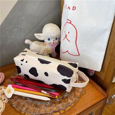 Origin: CN(Origin)Type: Pencil BagAge: >8 YEARS OLDType: Pencil BagUse: Schools & OfficesNovelty: NoModel Number: BD105 High School Office, Zipper Pencil Case, Pencil Case Stationery, Cute Canvas, Coin Bag, Cow Pattern, Pencil Bags, Pencil Pouch, College Student