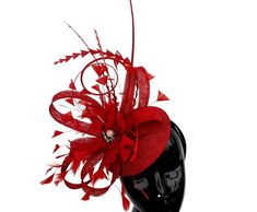 Red Fascinator With Viel, Church Hat, Wedding Hat, British Hat, Kentucky Derby Hat, Mini Hat (Available in other colours) NEED OTHER  STYLES AND COLOURS OF AFRICAN HEADWRAPS AUTOGELE, WEDDING HAND FANS, BRAIDED WIGS AND AFRICAN CORAL BRIDAL BEADS, VISIT OUR SHOP HERE: https://sereneafrica.etsy.com/  FEATURES   *Fascinator, headband, and feathers. *It can be customized *Available in other colours of your choice. *Light and comfortable to wear *Ships with DHL Express. Delivery to the USA, UK and E Red Brimmed Fascinator For Church, Red Brimmed Wedding Hat, Red Brimmed Mini Hat For Races, Elegant Red Brimmed Costume Hats And Headpieces, Red Curved Brim Fascinator For Church, Red Curved Brim Costume Hat For Wedding, Red Mini Hat With Short Brim For Church, Red Hats For Royal Ascot Wedding, Red Brimmed Mini Hat For Party