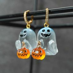 Halloween Ghost Hoop Earrings Charming Dangling Jewelry for Women gifts spooky fall earrings. Size: 2.6cm/1.02 in Length x 1.8cm/0.71 in Width  (one size) Whats included with your purchase:  2x Spooky Dangling Halloween Ghost earrings PRODUCT OVERVIEW: *Handmade Earrings  *Style: Halloween, Ghost, Dangling, Spooky, Earrings, Women's Jewelry, Fall Jewelry, Fall season *3D Spooky Ghost size : 1.02 in *Material: Stainless Steel, Acrylic, Transparent Item Colors:  WHITE, ORANGE , BLACK , ORANGE , BL Labu Halloween, Ghost Earrings, Pumpkin Earrings, Ghost Pumpkin, Halloween Earrings, Halloween Jewelry, Halloween Ghost, Girls Jewelry, Stainless Steel Earrings