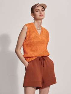 Made in our soft Chunky Cord Knit, this relaxed vest is a comfortable and stylish summer staple. Inspired by the classic sweater vest, design details include a V-neck, ribbed trims, and dropped armholes. Vest Design, Active Outfits, Classic Sweater, Coral And Gold, Summer Staples, Knit Vest, Summer Season, Sweater Vest, Design Details