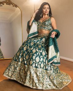 Bright green lehenga with silver and gold brocade work. Paired with a brocade blouse and dupatta with hand-embroidery DELIVERY TIMEPlease allow 1 week for your outfit to be dispatched. Professional cleaning only. Designer Brocade Lehenga With Gota Work, Brocade Lehenga With Gota Work For Designer Wear, Reception Choli With Gota Work In Banarasi Silk, Reception Banarasi Silk Choli With Gota Work, Banarasi Silk Choli With Gota Work For Reception, Designer Green Lehenga With Traditional Drape, Green Lehenga With Traditional Drape For Designer Wear, Green Chanderi Lehenga With Cutdana, Green Lehenga With Cutdana In Traditional Drape