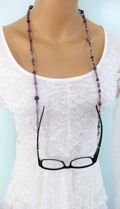 "Purple beaded Glasses Chain, and Glasses Necklace combination hand made by Ralston Originals. This is a unique original style glasses chain, and necklace combination designed by Ralston Originals. Unique from any other glasses chains on Etsy, Ralston Originals was the first to add the lobster clasp at the end of the chain to join together to make a Necklace. Brilliant! This makes it even more unique because you now have two pieces of jewelry in one!! Wear it to work or out shopping as a Necklac Handmade Glass Beads For Jewelry Making, Handmade Spiritual Glass Beads, Bohemian Glass Beaded Chain, Spiritual Handmade Glass Beads, Glass Glasses Chains With Colorful Beads For Gifts, Handmade Adjustable Glasses Chains With Round Beads, Colorful Round Beads Glasses Chain As Gift, Gift Glasses Chains With Colorful Glass Beads, Gift Colorful Glass Beads Glasses Chains